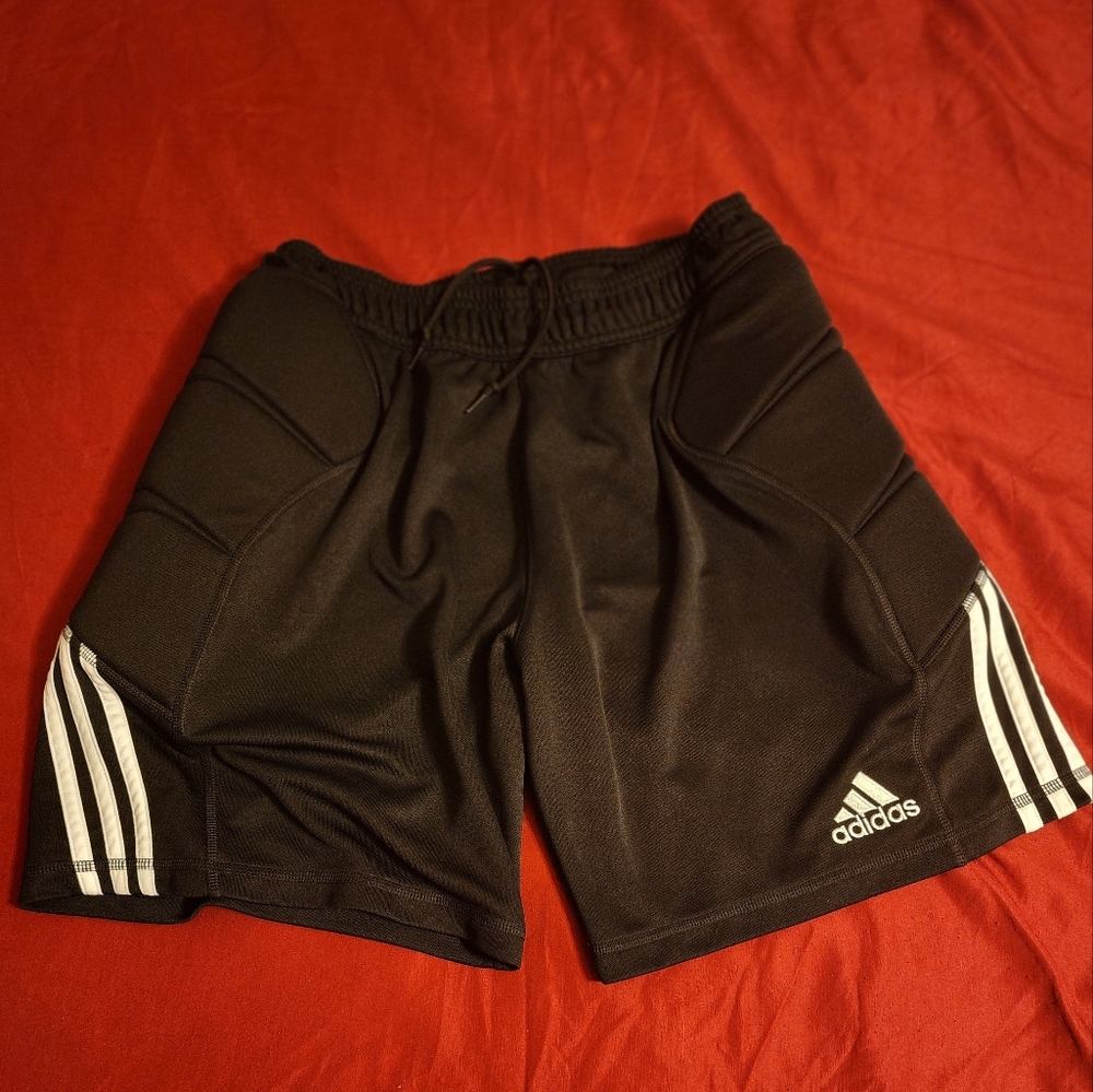Adidas goalie short with protection on each side. Size L